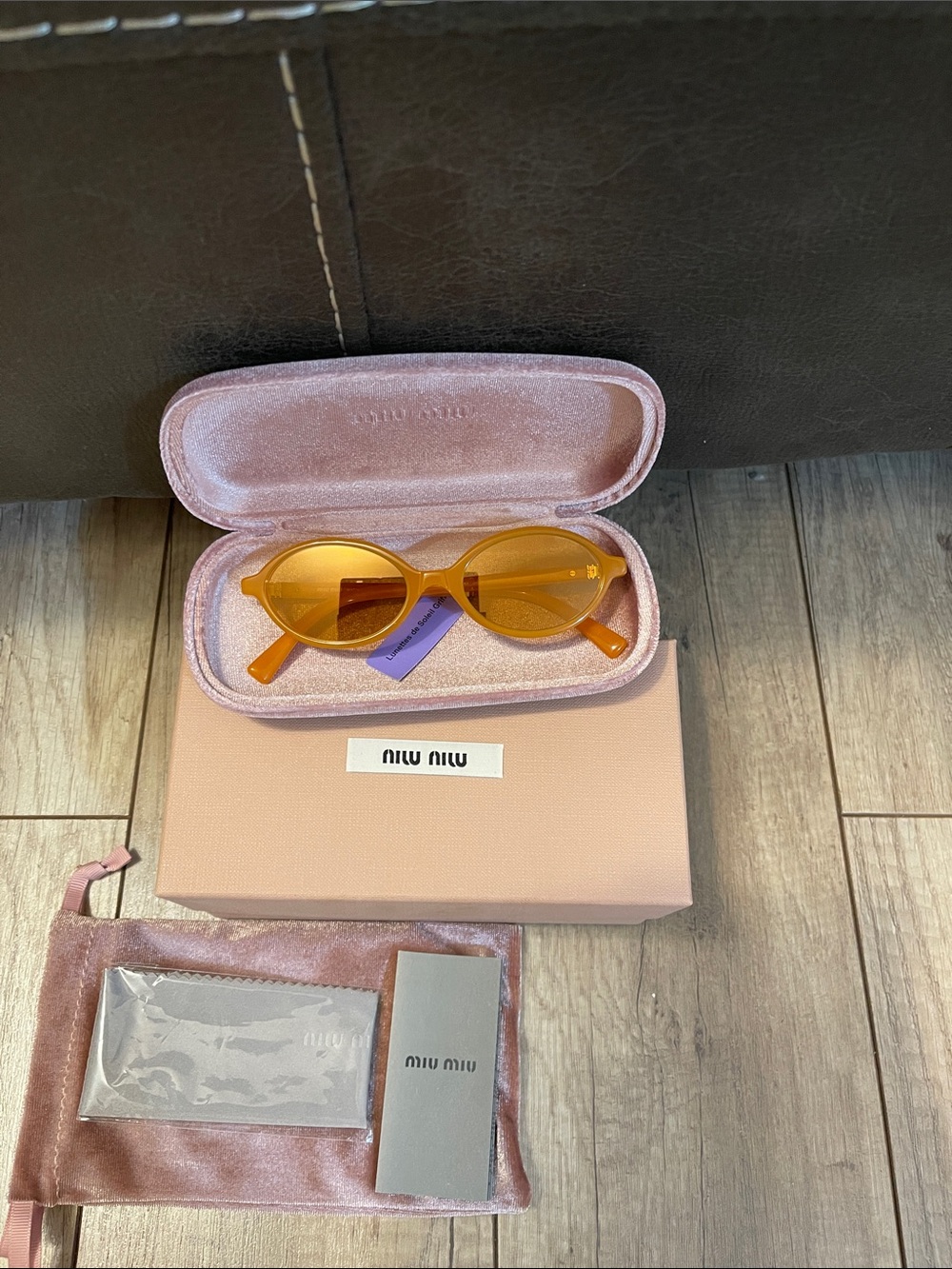 Miu Miu Orange Oval mirror Sunglasses